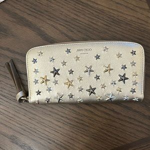 BRAND NEW Jimmy Choo London metallic grainy leather with stars wallet brand NEW
